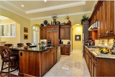 Luxurious and open gourmet kitchen with Viking app