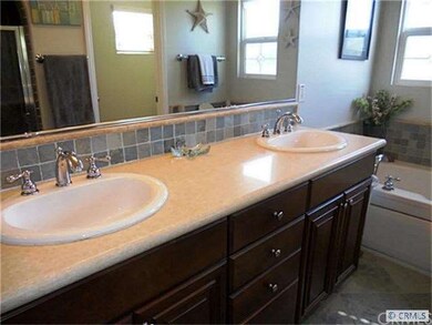 Upgrades throughout with designer tile, stone and 