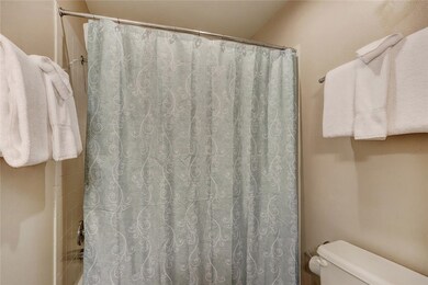Bath with shower/tub combination.