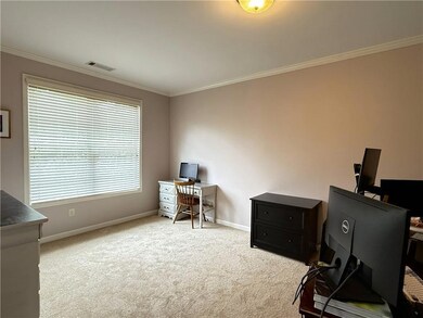 Separate entry room currently used as an office bu