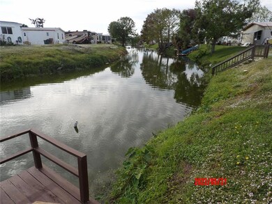 Home is on canal and has a dock