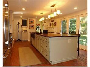 Kitchen. 11+ foot mahogany island seats 7 or more,