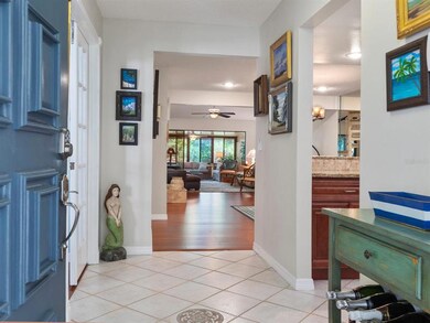 Inviting Foyer With Tile Floors On The Diagonal Leading To Expansive Great Room.