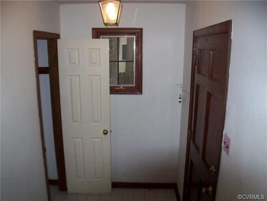 Main Entry foyer. Coat Closet. Tile Floor