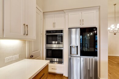 Built in double ovens and full size LG refrigerato