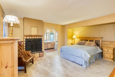 master bedroom with fireplace
