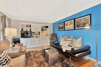 Living Room with built-in cabinets and bookcases.