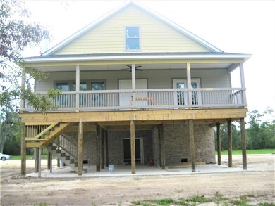 A wonderful back porch with access from the great