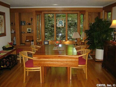 Dining Room. Spacious dining room with windows cap
