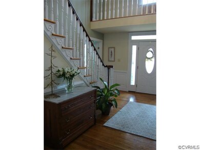 Beautiful 2 story Foyer with custom baluster, hard