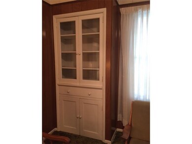 Dining Room. Beautiful built-in cabinet in formal 
