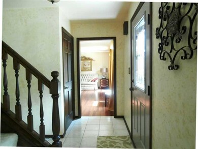 Entry/Foyer. Ceramic Tile Flooring    Coat Closet