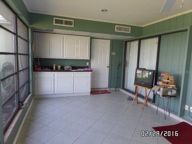 FLORIDA ROOM... NOW PAINTED LT BLUE/GREY