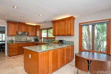 Large breakfast nook with view of amazing yard