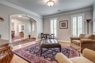 Large living room opens to the center hall foyer a