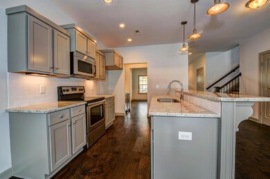 Modern finishes throughout. Picture of a similar unit.