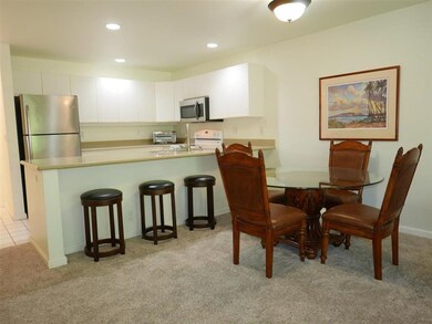 Dining areas include a table with four chairs and 