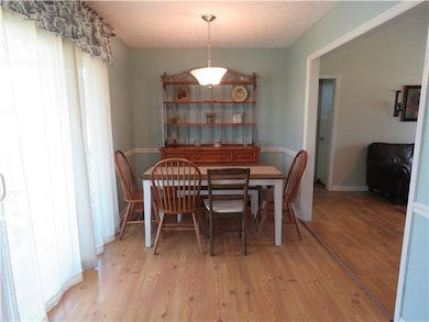 Eat-in area of Kitchen. Sliding doors to the left lead to the deck