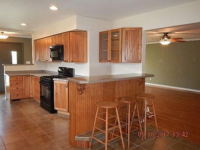 KITCHEN OPEN TO LIVING ROOM