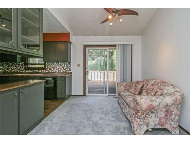 Dining L area with access to deck