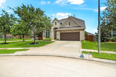 Professionally manicured landscaping front and bac