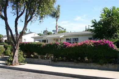Tree lined street. Hedged landscaping for some privacy from the street.