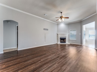 Spacious living room with fireplace.
