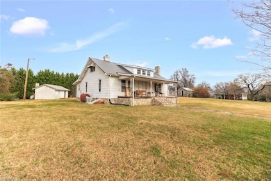 2445 Amostown Rd, Sandy Ridge, NC 27046 - photo 2