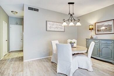 The half bath and attached garage are located thro
