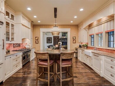 Chefs kitchen with 8' island and copper bar top