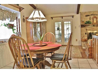 Photo. Breakfast area that leads to back covered p