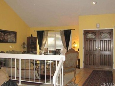 Looking at Front Room with vaulted ceilings