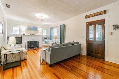 Spacious living room with wood burning fire place,