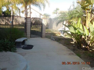 Courtyard with gated rear yard access w fountain
