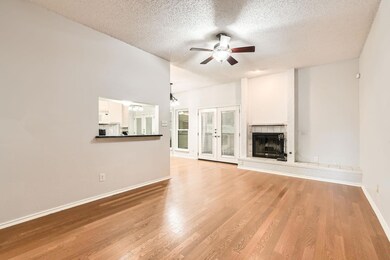 Unfurnished living room with wood finished floors