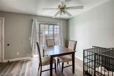 Separate dining area w/glass sliding doors to cour