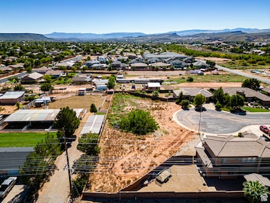 Aerial perspective of suburban area with a mountainous background