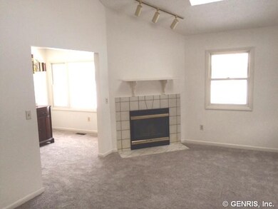 Living Room Fresh paint & carpeting throughout!