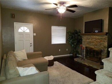 Entry to living room with newly laminate flooring