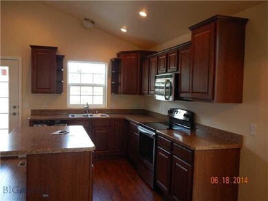 Kitchen. Photo of similar home.