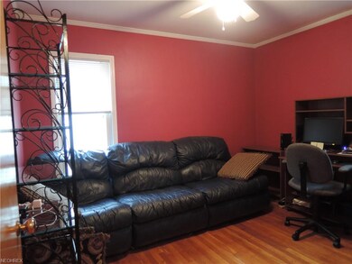 Second first floor bedroom with ceiling fan & hard