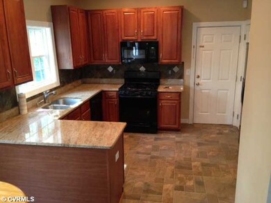 Kitchen - View of Kitchen with Granite Counters, T