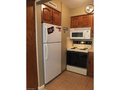 Kitchen with tile floor.