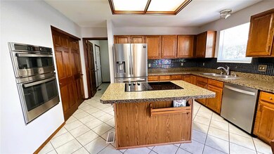 Kitchen - SS appliances with center island