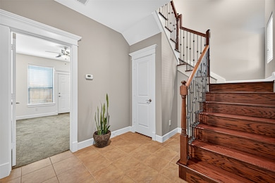 The foyer has a spacious coat/storage closet and room for a console table plus bench - if desired. Additionally, artwork can be displayed in this area. There is direct access into the garage and the first floor bedroom from the foyer.