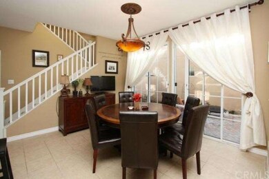 Dining area opens up to side yard.