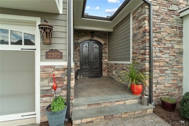 Gorgeous front entry w/ Custom Iron Doors w/ remov
