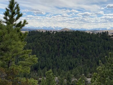 The Bear Tooth Mountains to the South