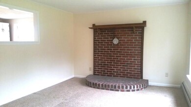 Living room opening to kitchen