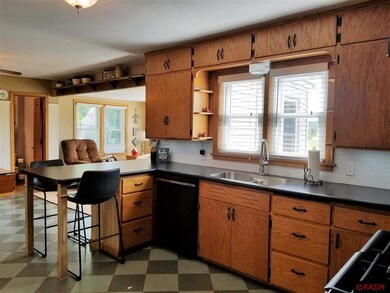 New countertops,  undermount sink, backsplash, and
